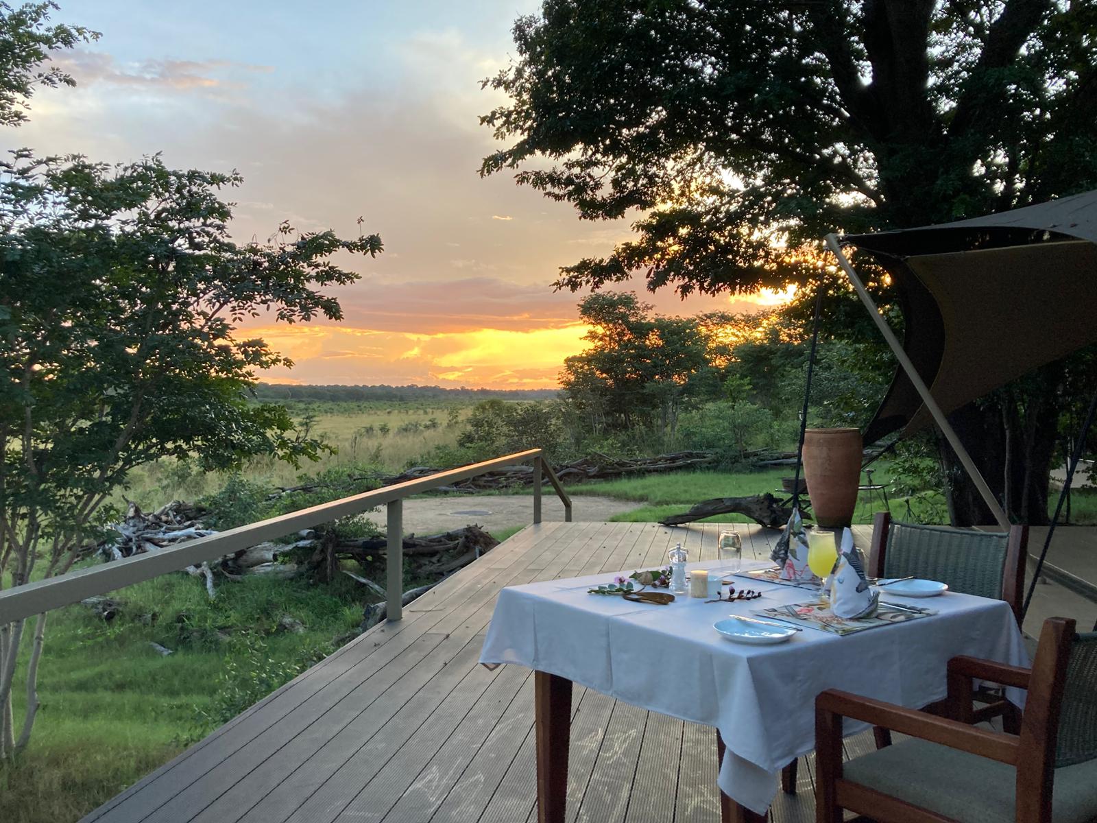 Sunrise over African bush with breakfast
